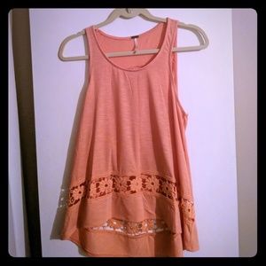 Orange high-low top with crochet flower border